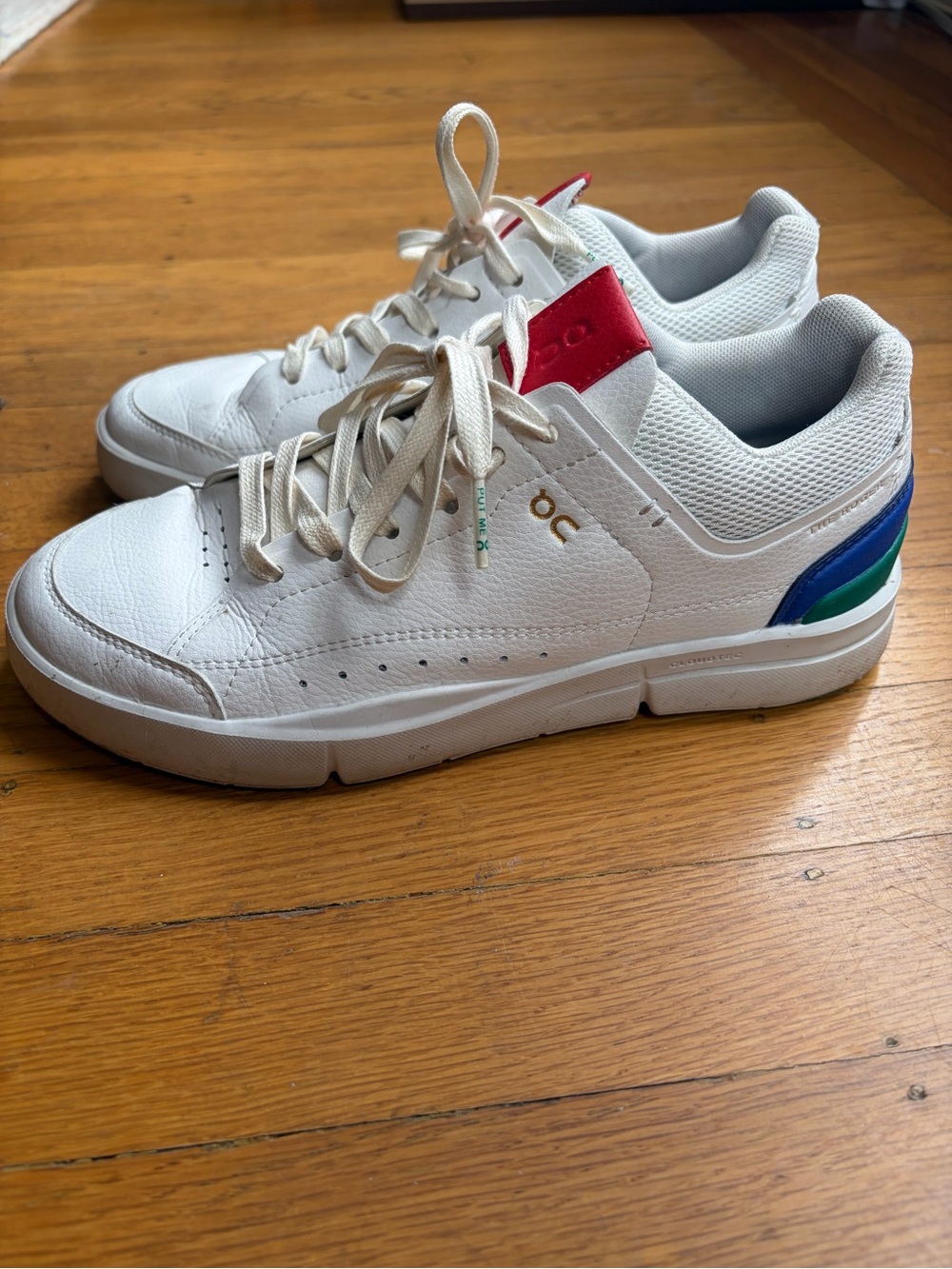 On Running White Low-Top Sneakers with Blue, Green & Red Accents